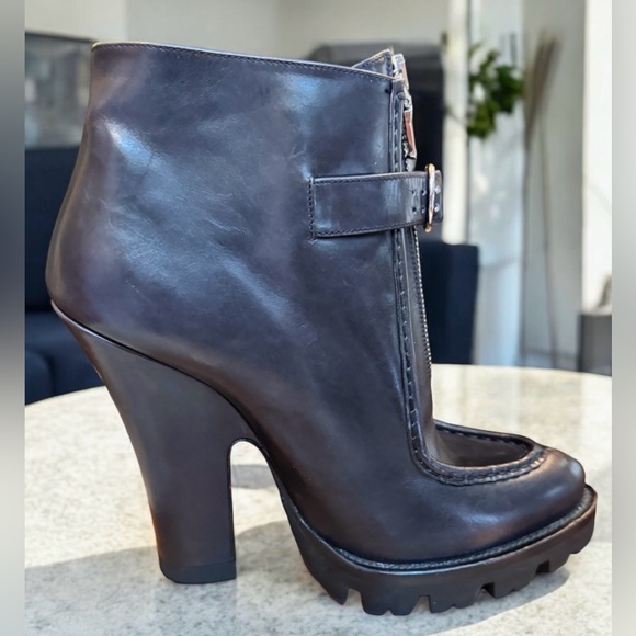 NWOT. Prada black leather boots with silver hardware. Front zipper - Picture 1 of 12